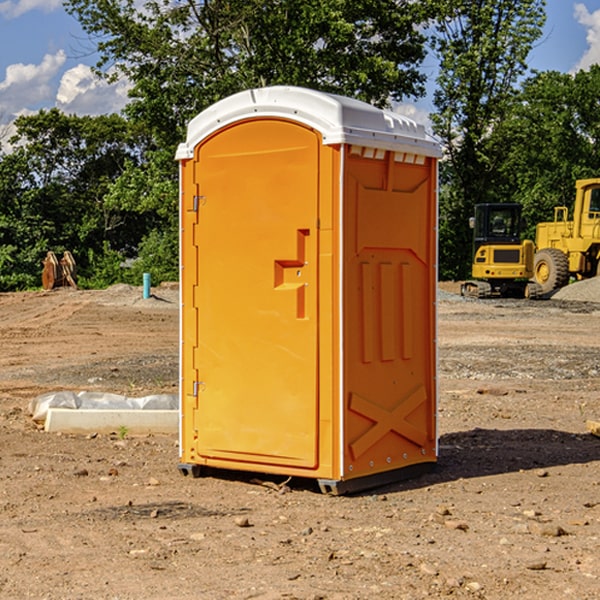 how often are the portable restrooms cleaned and serviced during a rental period in Langlade County